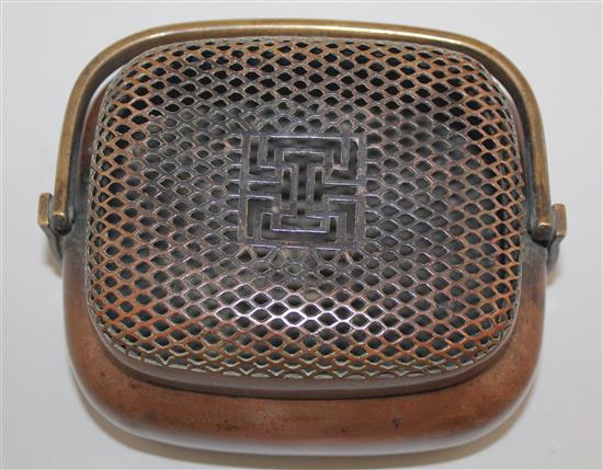 A Chinese copper bronze oblong hand warmer, 18th / 19th century, 15cm